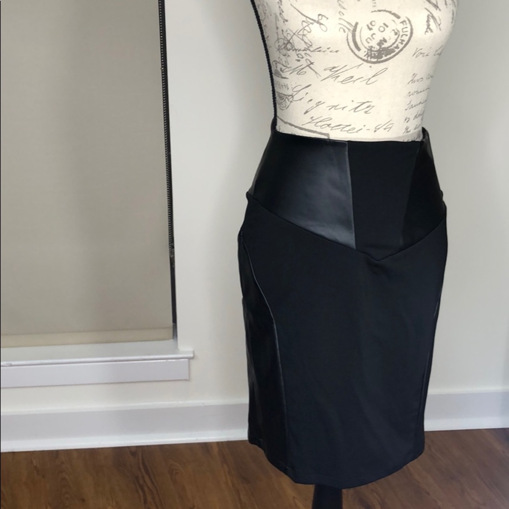 Smooth faux leather
High-rise
Paneled front